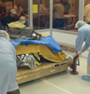 Genesis capsule being moved into intermediate cleanroom at UTTR (small)