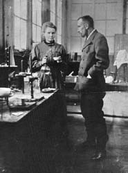 Marie and Pierre Curie in their laboratory