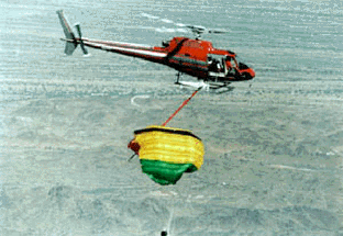 Helicopter descending Genesis capsule