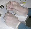 closeup of loading samples into mount for SIMS analysis