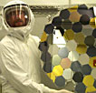 scientist holding solar array