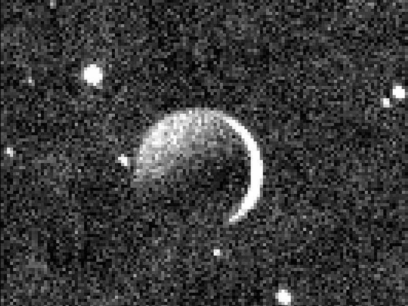 Black and white image of Charon with star field