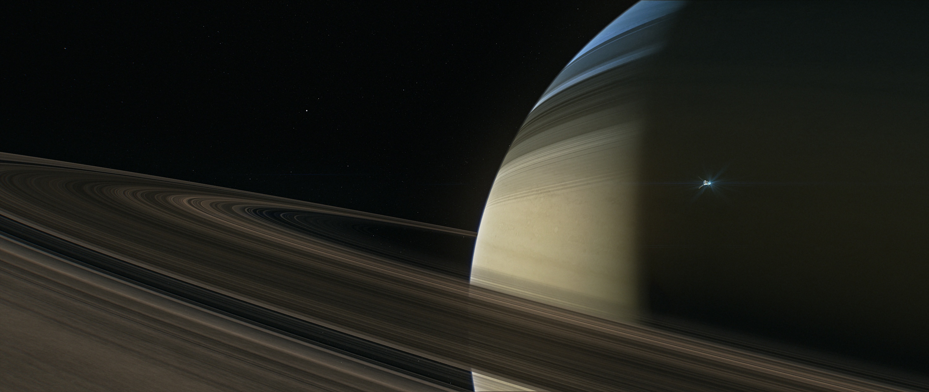 Color illustration of Cassini entering Saturn orbit.