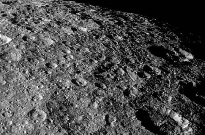 Cassini took this image of the heavily cratered surface of Rhea