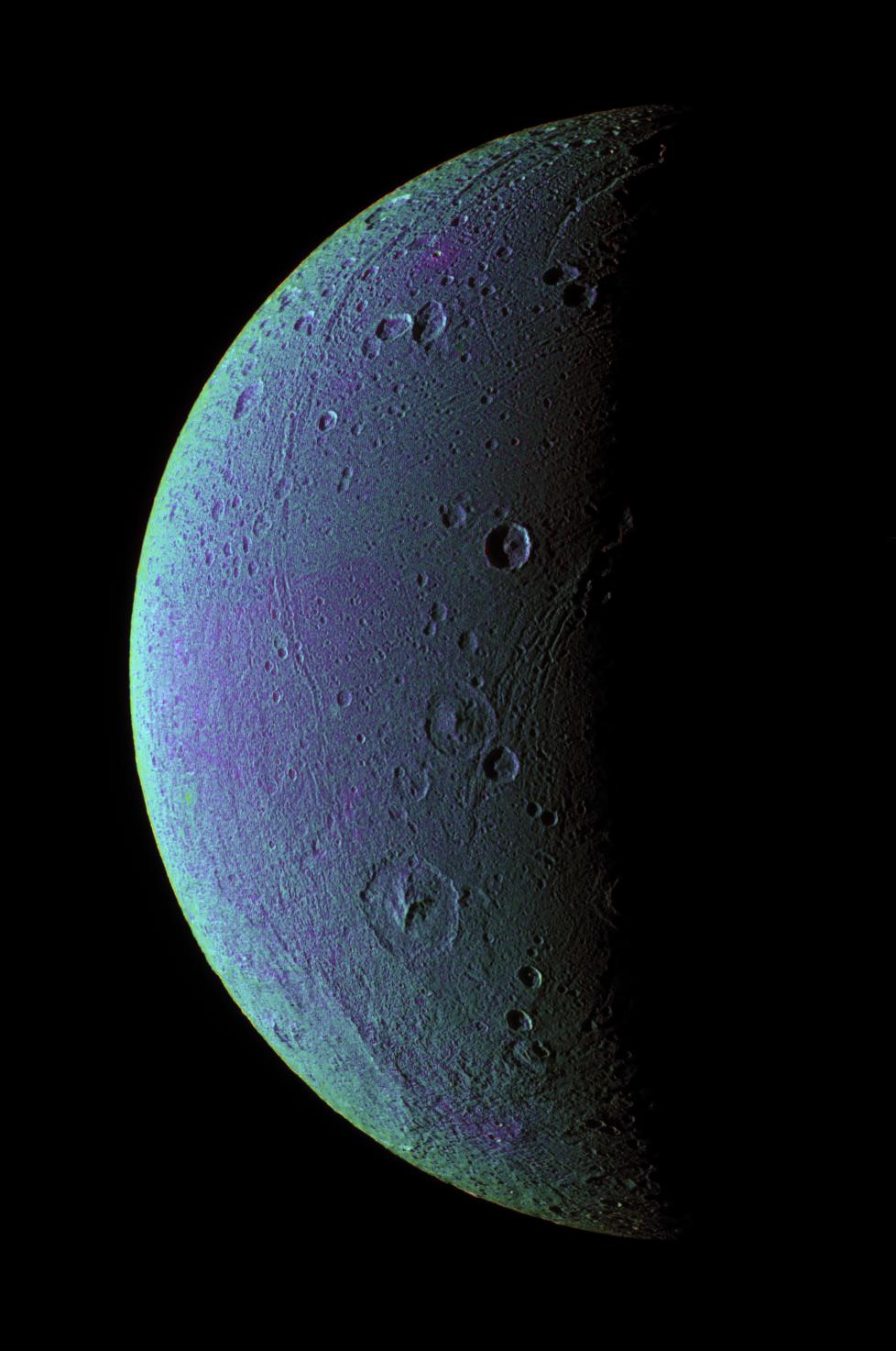 This view highlights tectonic faults and craters on Dione, an icy world that has undoubtedly experienced geologic activity since its formation.