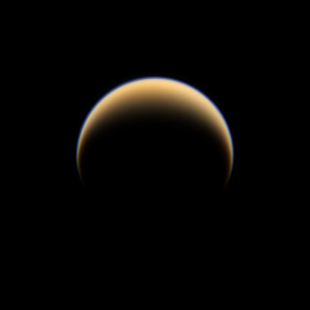 The Cassini spacecraft looks down on the north pole of Titan, showing night and day in the northern hemisphere of Saturn's largest moon.