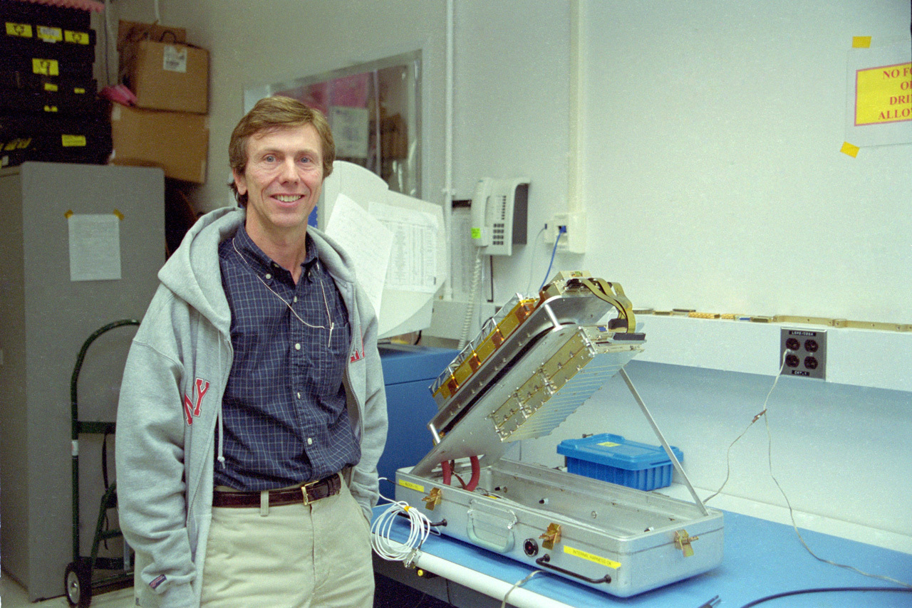 Neil Gehrels with spacecraft instrument.