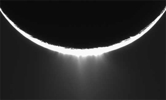 Animated GIF of Enceladus venting water-ice into space.