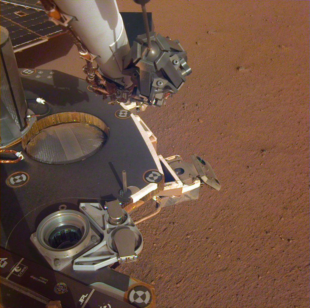 spacecraft hardware above Martian soil