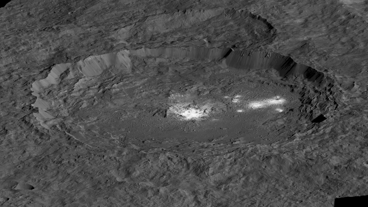 Crater with bright white area in center.
