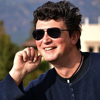 Konstantin Batygin wearing dark sunglasses.