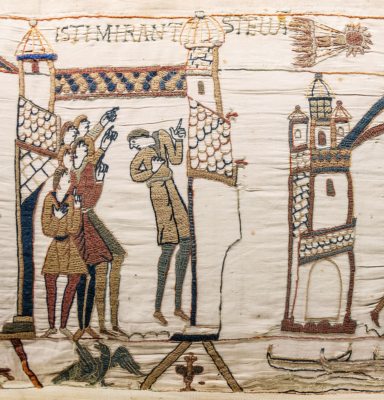 Tapestry on men looking at comet.