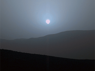 Sequence of Sun setting on the horizon of Mars.