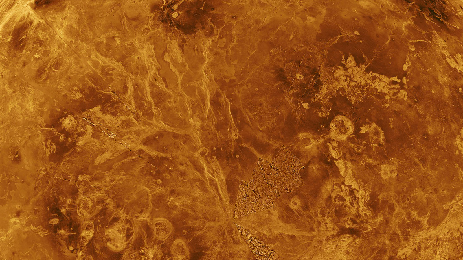 Vista completa de Venus, mostrando un complejo paisaje de montañas, cráteres y flujos de lava