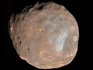 Close up on potato-shaped Phobos