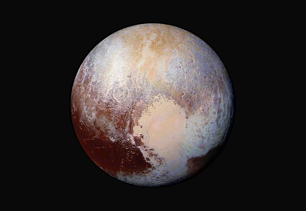 Enhanced view of Pluto revealing a heart-shaped region of glaciers.