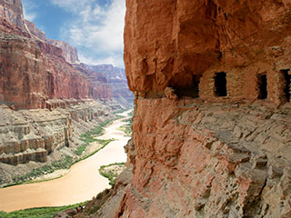 Windows and doors built into cliff face of the Grand Canyon