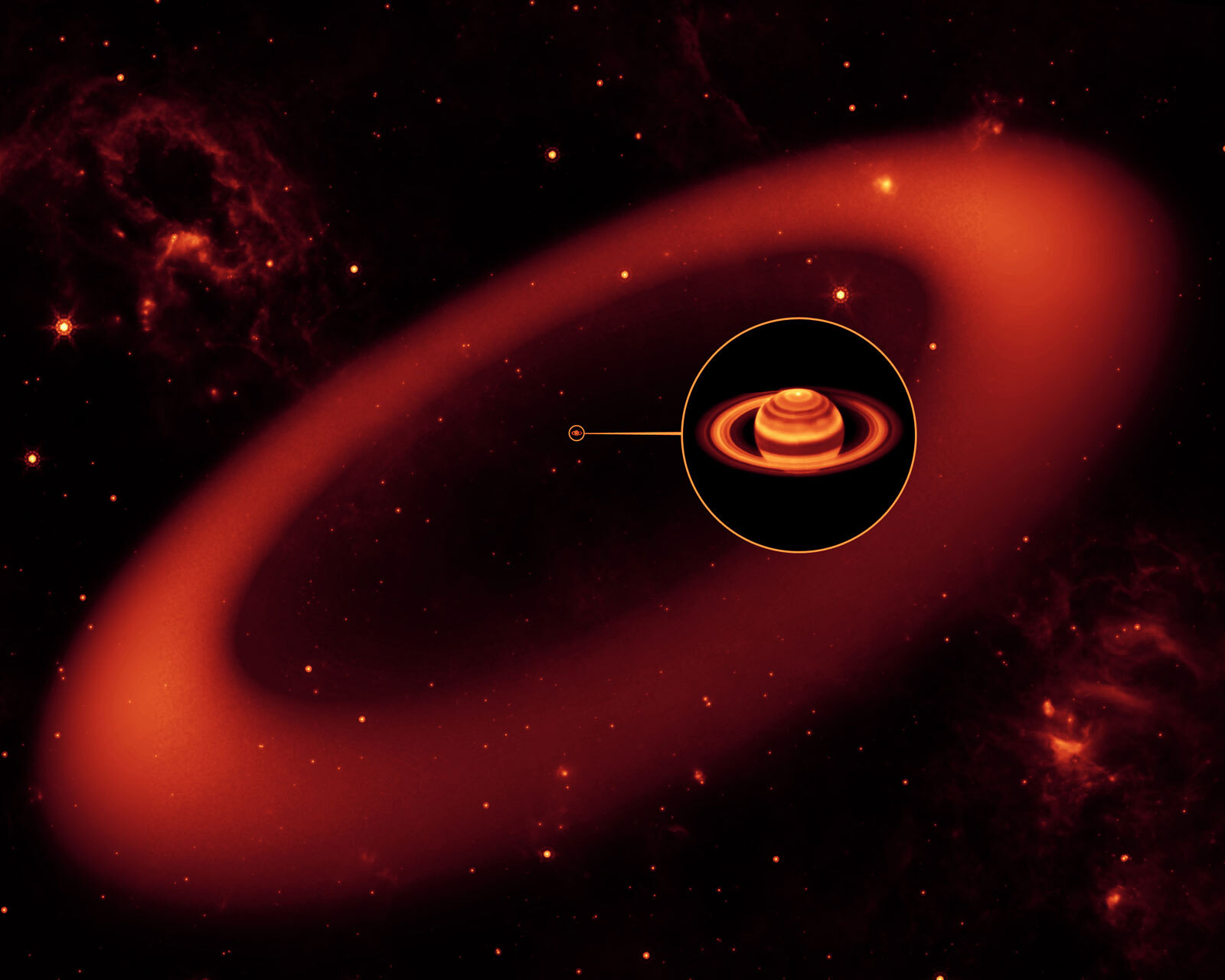Illustration of giant ring extending far beyond Saturn's main rings.