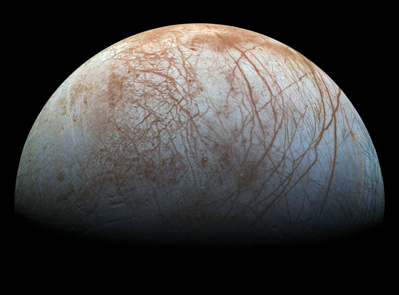 The icy, scarred surface of Jupiter's ocean moon Europa.