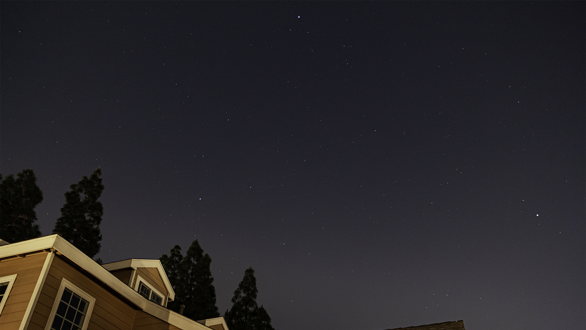 Night sky photo of the Summer Triangle with stars labeled.