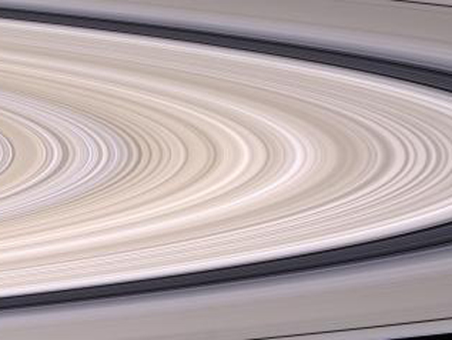 Saturn's most prominent feature, its dazzling ring system, takes center stage in this stunning natural color mosaic which reveals the color and diversity present in this wonder of the solar system.