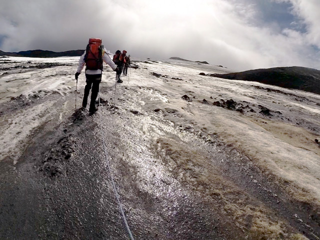 Scientists hiking to a volcano in Iceland.