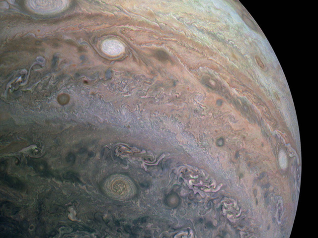 enhanced-color image of the striking cloud bands of Jupiter’s southern latitudes