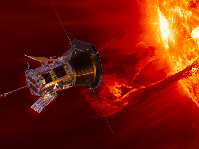 The Parker Solar Probe mission flies toward an orange and red Sun.