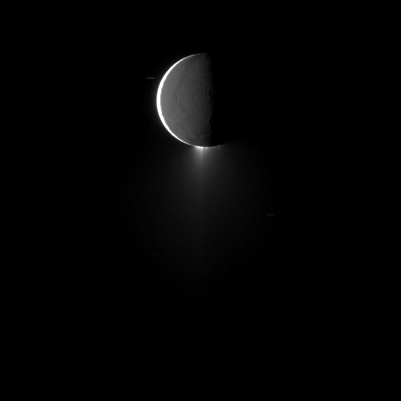 Saturn's moon Enceladus, imaged at high phase, shows off its spectacular water ice plumes emanating from its south polar region.

