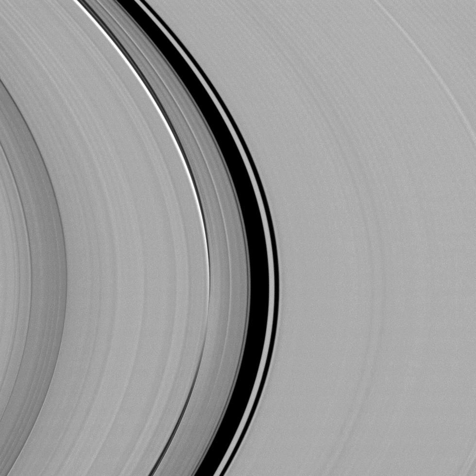 A dynamical interplay between Saturn's largest moon, Titan, and its rings is captured in this view from NASA's Cassini spacecraft.