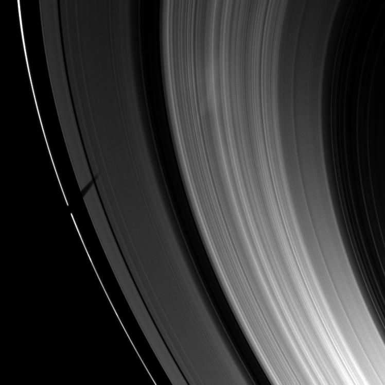 Tethys' shadow over Saturn's rings