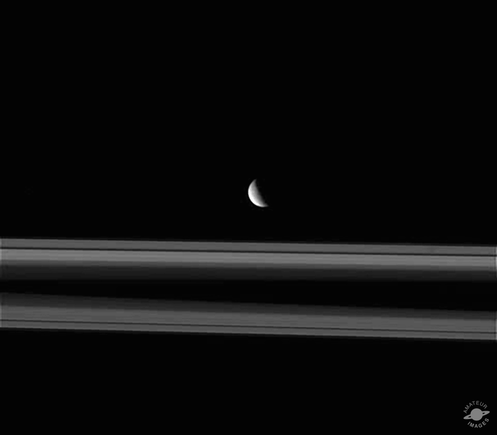 Animated GIF of moon moving over rings.