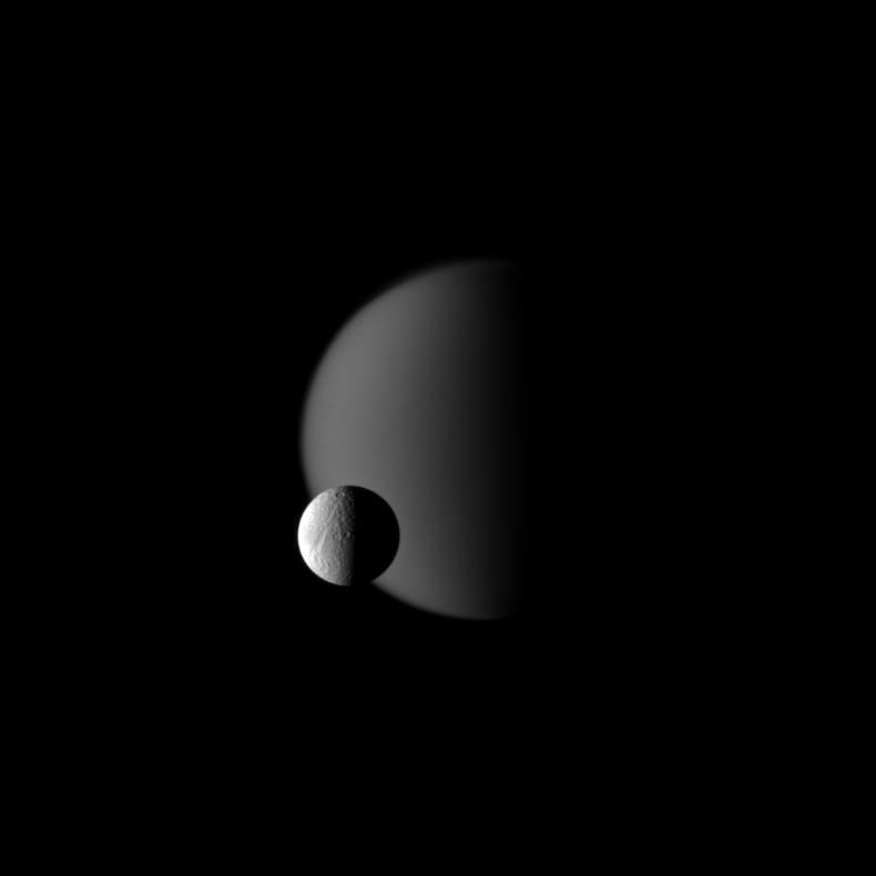 Tethys in front of Titan