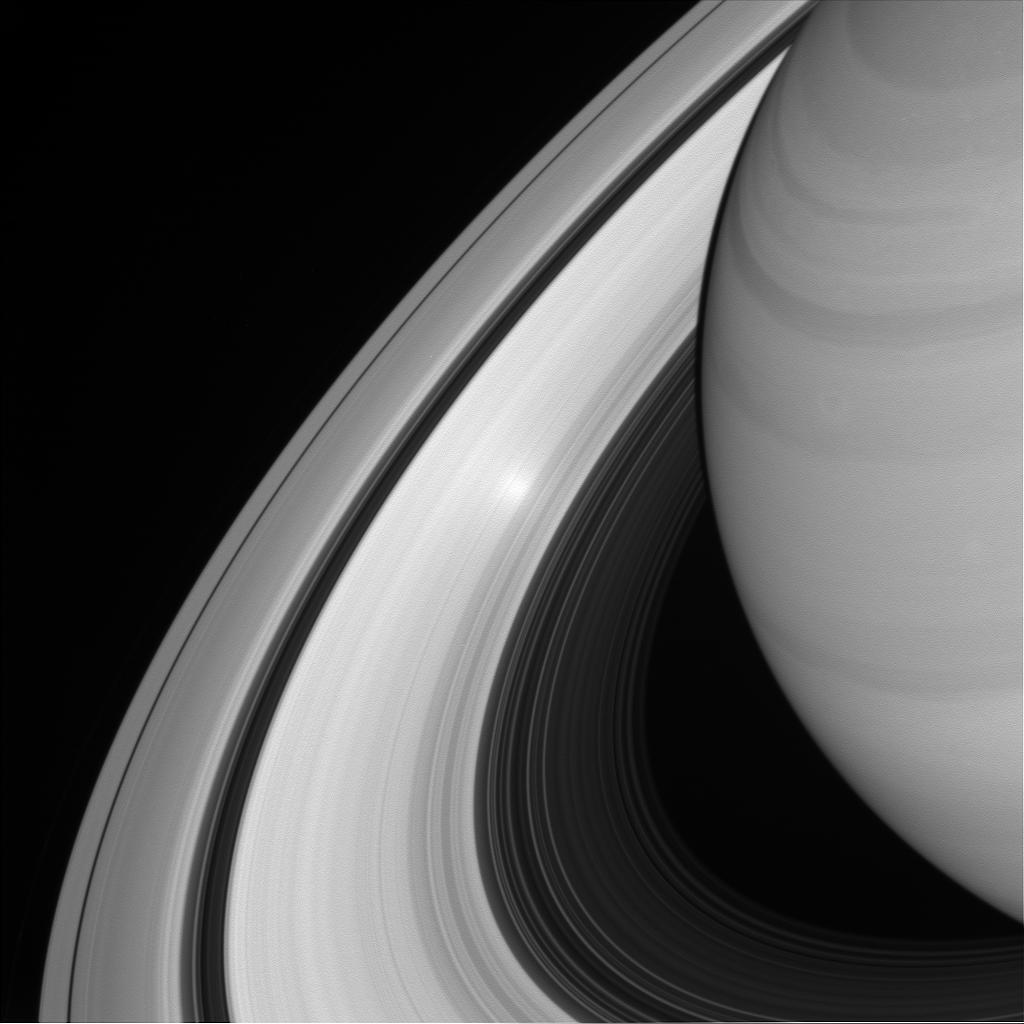 An ethereal, glowing spot appears on Saturn's B ring in this view from NASA's Cassini spacecraft.