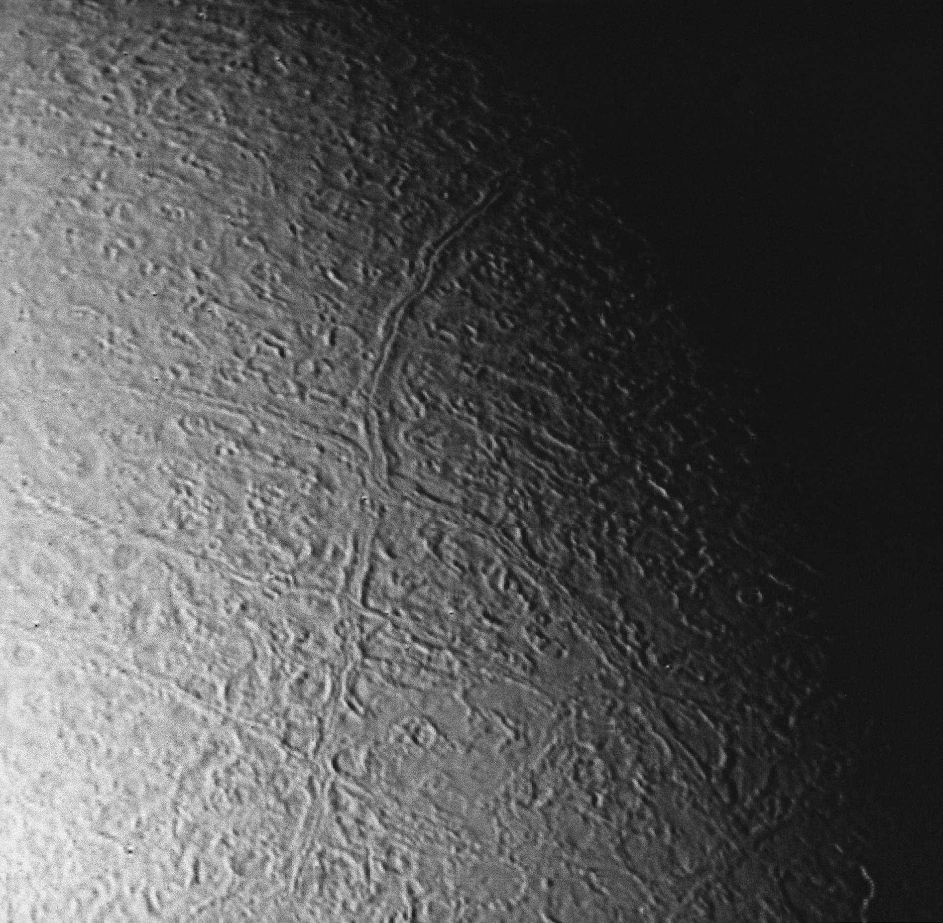 This image of Triton was taken from a distance of about 130,000 kilometers (80,000 miles) at 12:20 a.m. PDT Aug. 25 1989.