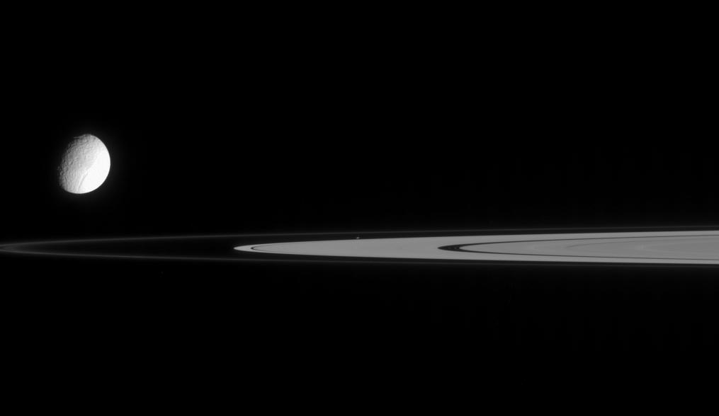 Tethys, Saturn's rings, and tiny Atlas