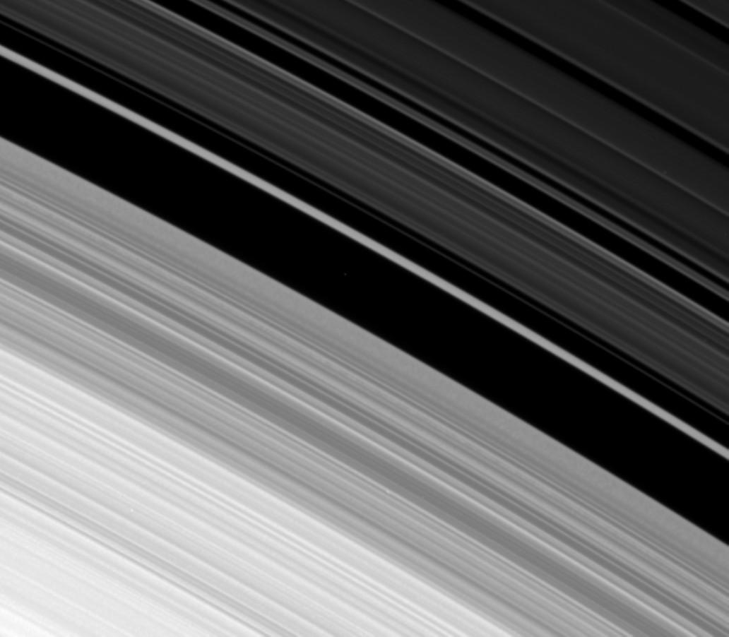This movie, made from images obtained by NASA’s Cassini spacecraft of the outer edge of Saturn’s B ring, reveals the combined effects of a tugging moon and oscillations that can naturally occur in disks like Saturn's rings and spiral galaxies. 