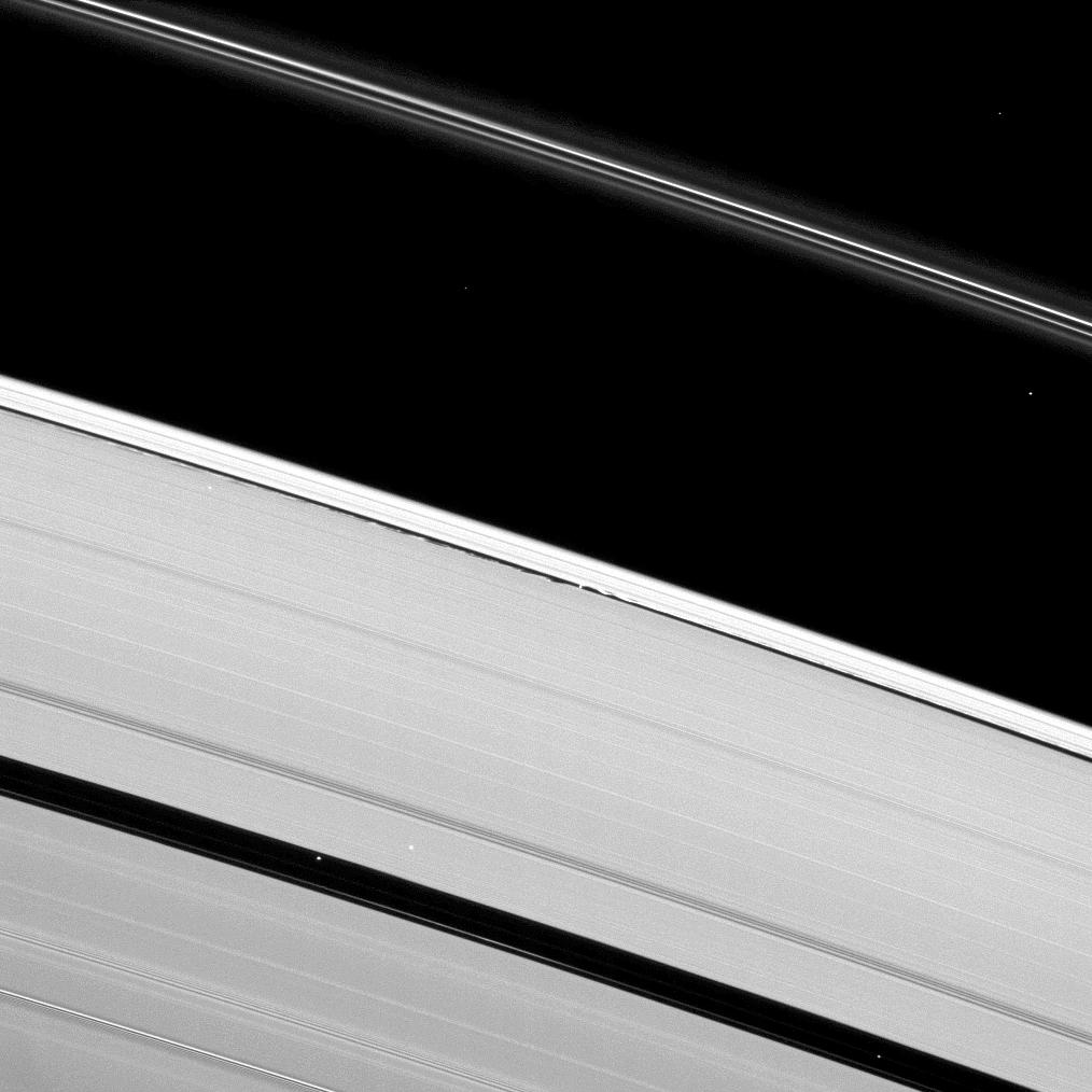 Saturn's moon Daphnis creates waves of disturbance in the Keeler Gap