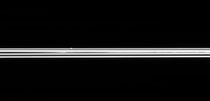 The small ring moon Atlas, on the far side of Saturn's immense ring system