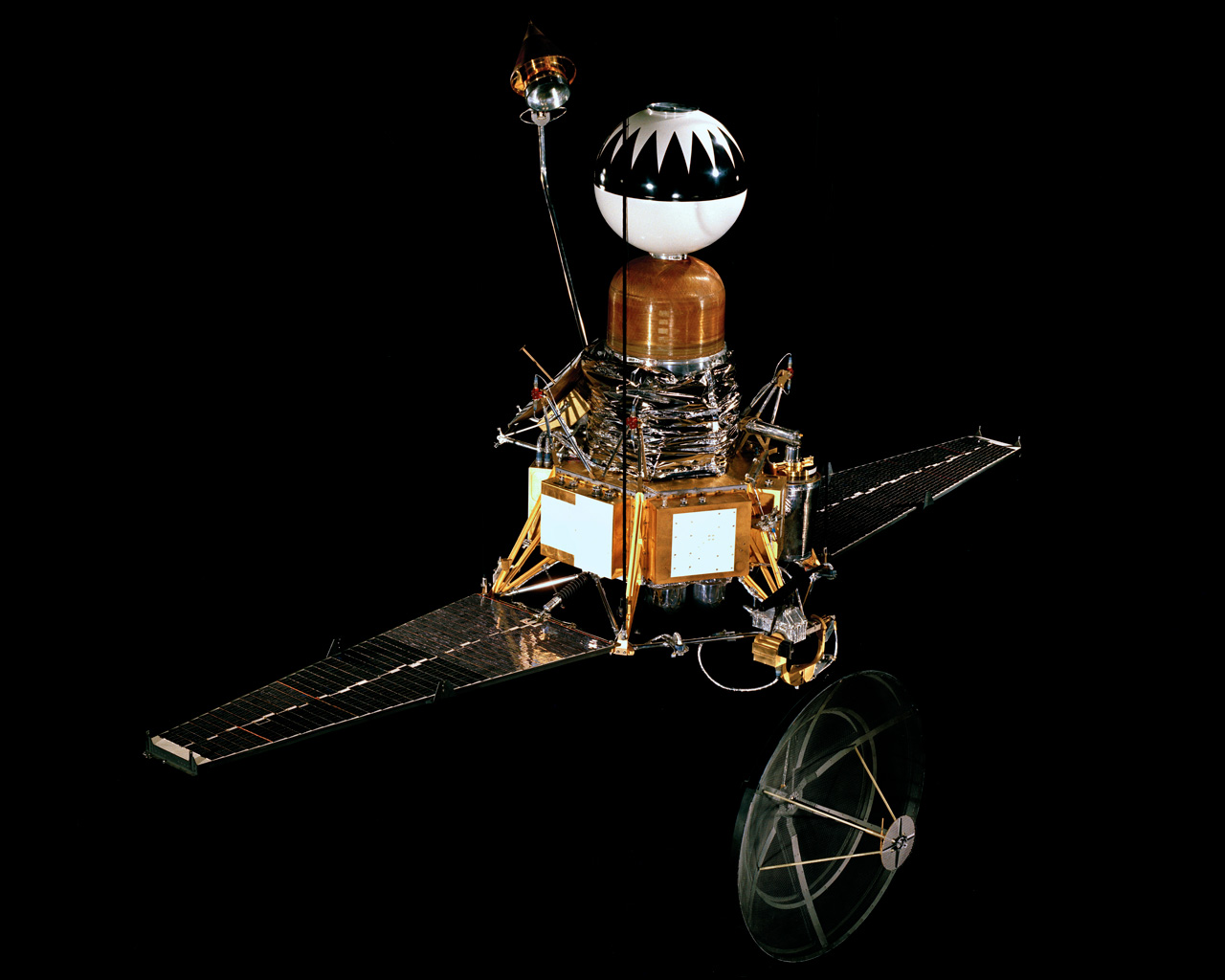 Photo of spacecraft with a black background.