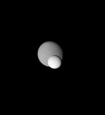 Enceladus, front, and Dione