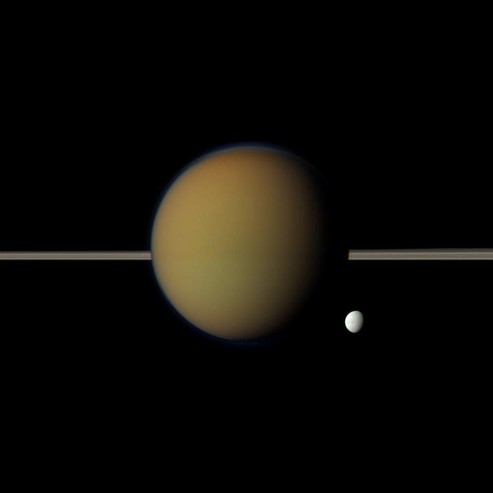 Tethys and Titan, with Saturn's rings between them