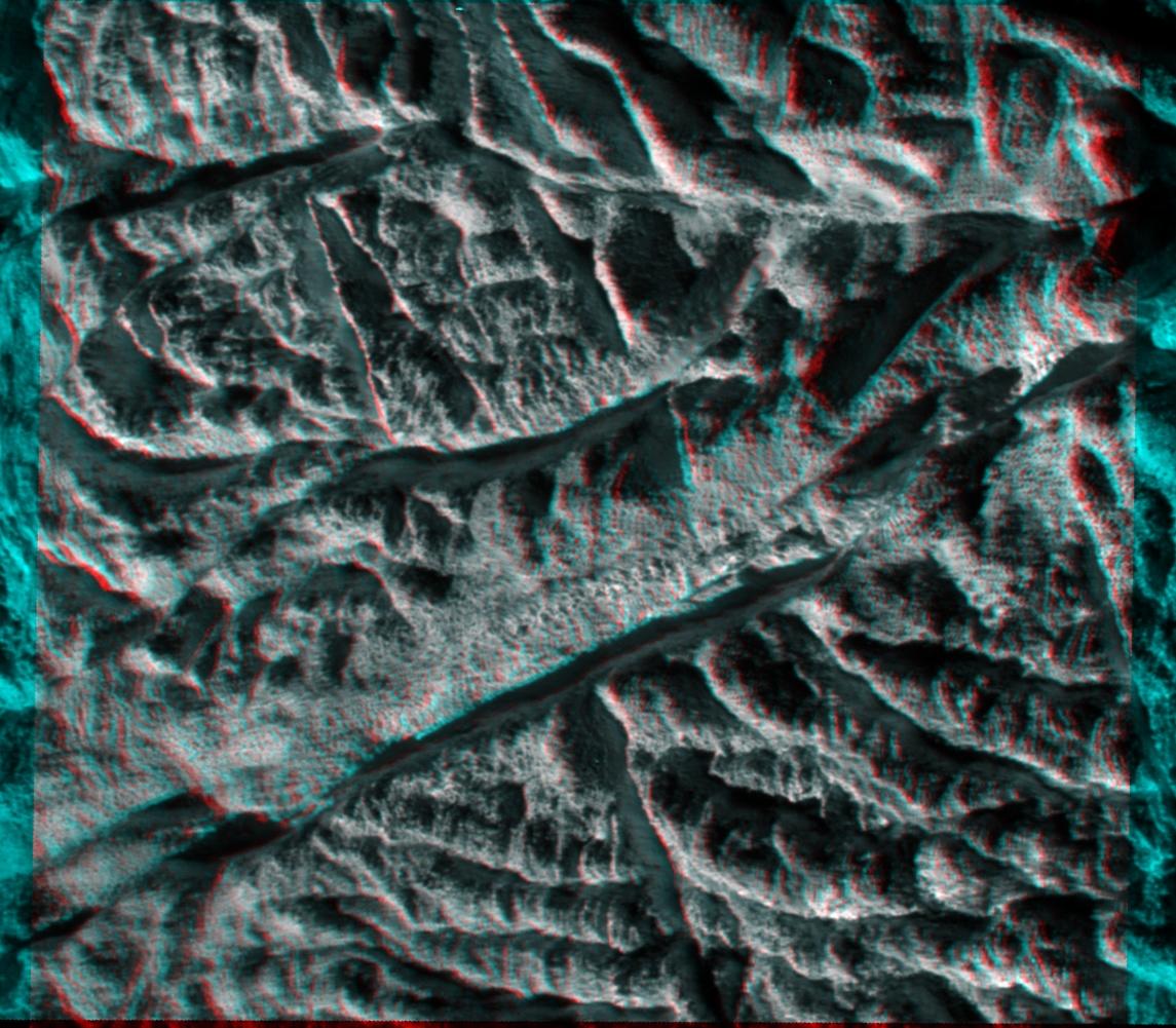 This anaglyph made from images captured by NASA’s Cassini spacecraft shows a dramatic, 3-D view of one of the deep fractures nicknamed "tiger stripes" on Saturn’s moon Enceladus. 