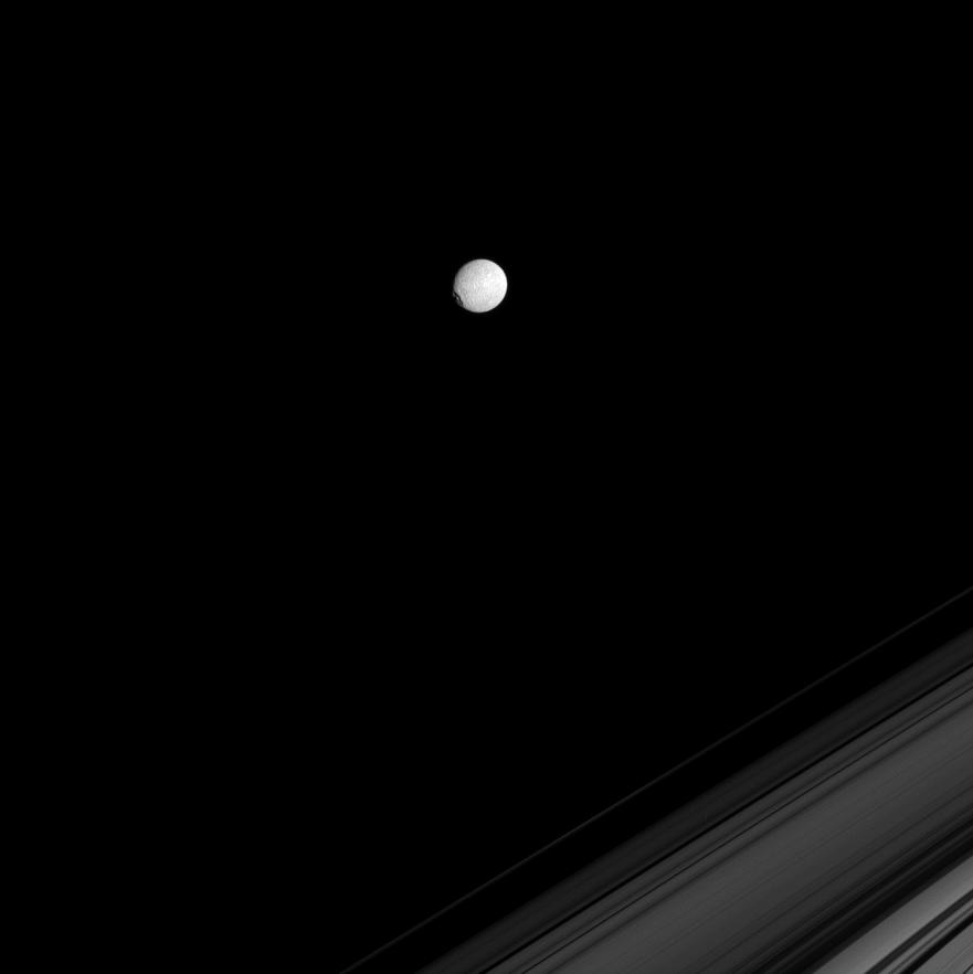Mimas and a part of Saturn's rings