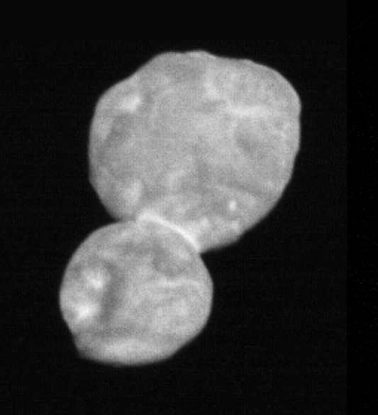 two-lobed object floating in dark space