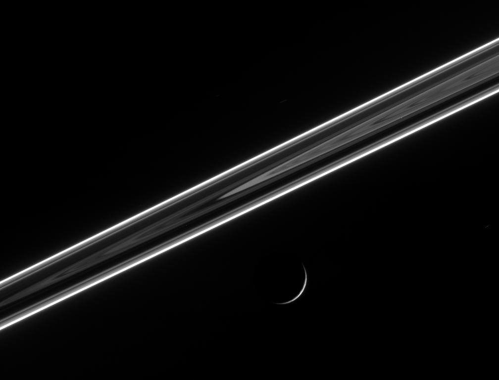 The dark side of the ringplane and Dione