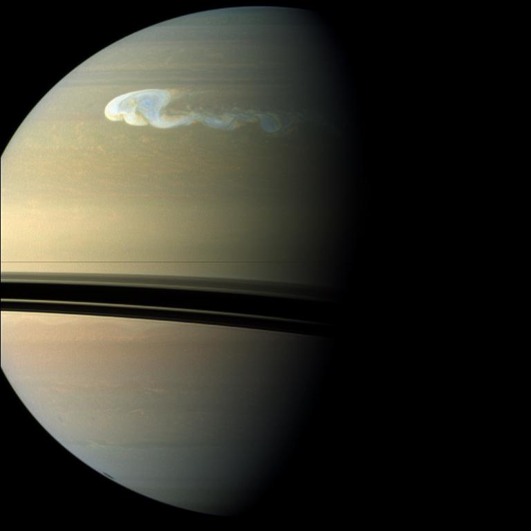 A near-true-color view of the huge storm churning through the atmosphere in Saturn's northern hemisphere