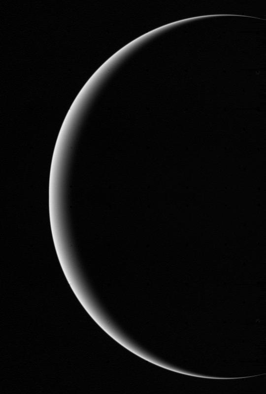 This image shows a crescent Uranus, a view that Earthlings never witnessed until Voyager 2 flew near and then beyond Uranus on January 24, 1986.