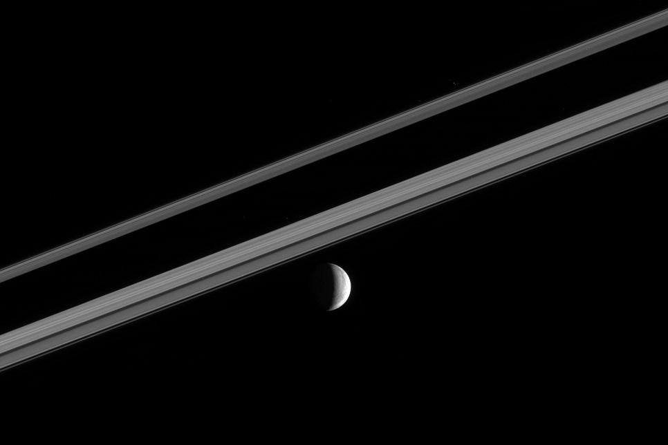 Enceladus near a part of Saturn's rings