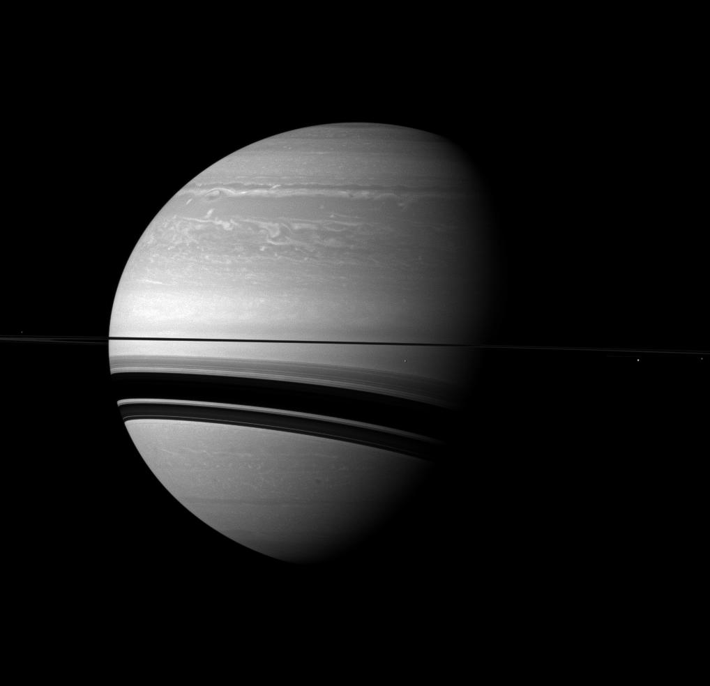 The Cassini spacecraft examines Saturn and the planet's northern hemisphere, which was ravaged by a huge storm for much of 2011.